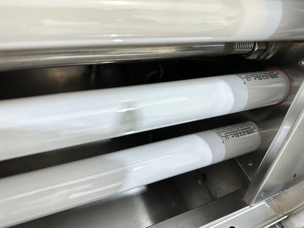 UV aging test chamber for coatings and inks